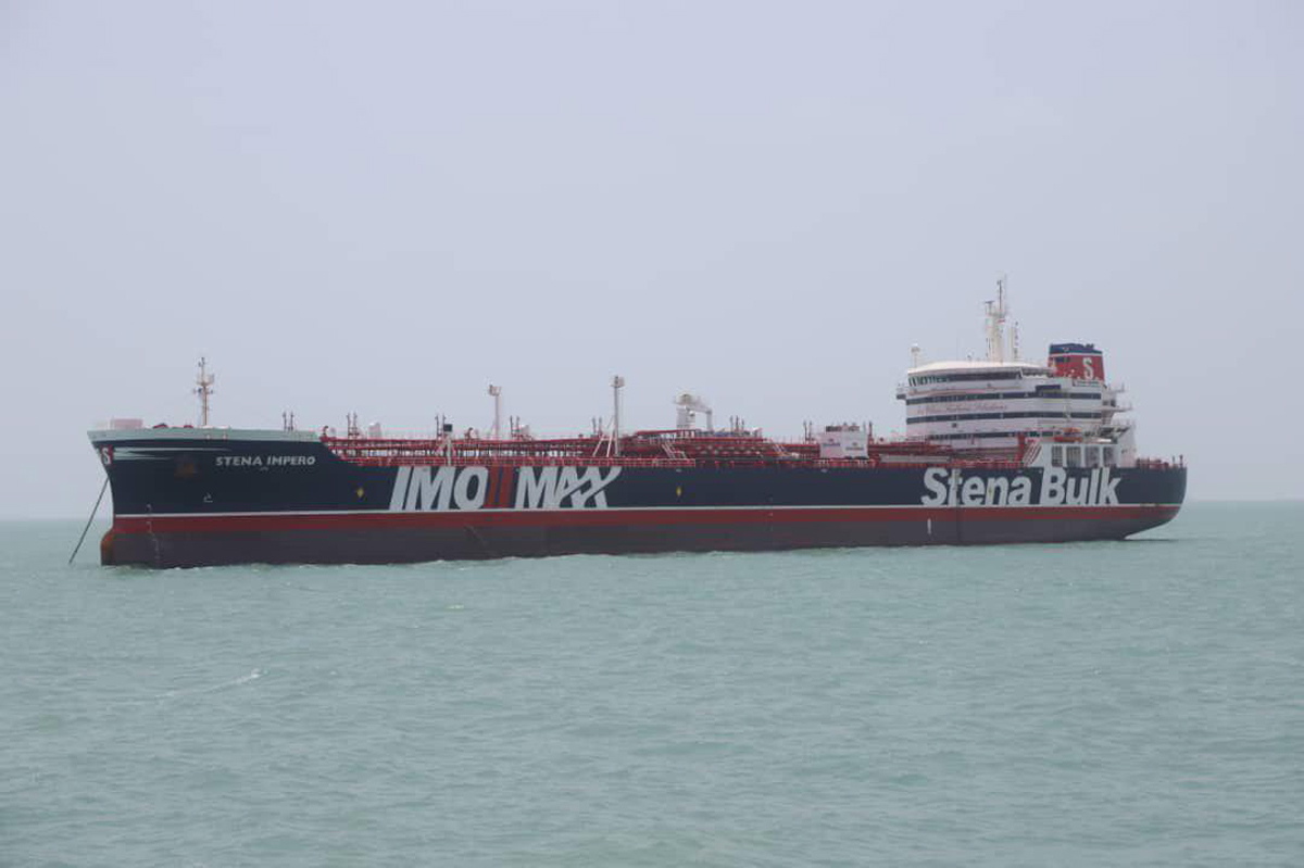 epa07728740 A handout picture released by Tasnim News Agency shows British flagged oil tanker Stena Impero in Bandar Abbas Anchorage in southern Iran, 20 July 2019. Iranian Revolutionary Guard Corps (IRGC) claims to have seized the Stena Impero at the Strait of Hormuz with 23 crew on board. Stena Bulk has issued a statement that the vessel had been 'approached by unidentified small crafts and a helicopter during transit of the Strait of Hormuz'.  EPA/Tasnim News Agency HANDOUT  HANDOUT EDITORIAL USE ONLY/NO SALES