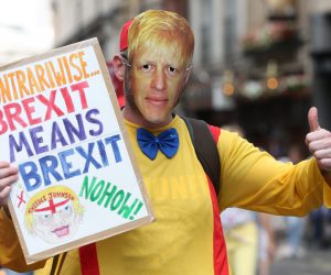epa07729698 An Anti Brexit protester dressed as Boris Johnson takes part in the No to Boris, Yes to EU March in London, Britain, 20 July 2019. People gathered to march against Brexit and Boris Johnson to likely be named as the new British Prime Minister.  EPA/HOLLIE ADAMS