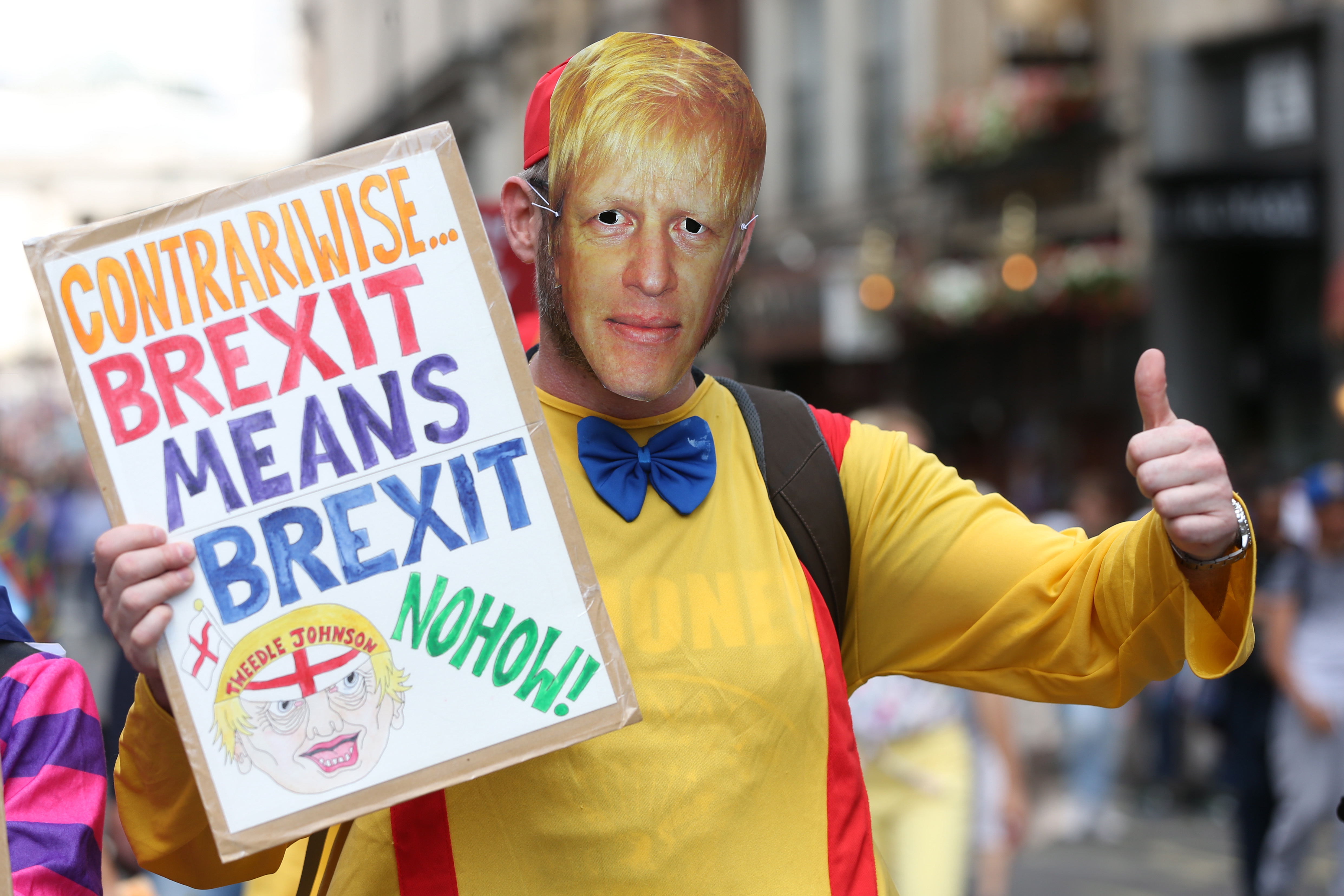 epa07729698 An Anti Brexit protester dressed as Boris Johnson takes part in the No to Boris, Yes to EU March in London, Britain, 20 July 2019. People gathered to march against Brexit and Boris Johnson to likely be named as the new British Prime Minister.  EPA/HOLLIE ADAMS