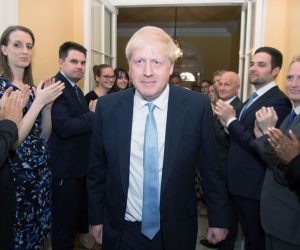 epa07737851 Prime Minister Boris Johnson is clapped into 10 Downing Street central London, Britain, 24 July 2019 by staff after seeing Queen Elizabeth II and accepting her invitation to become Prime Minister and form a new government. Former London mayor and foreign secretary Boris Johnson is taking over the post after his election as party leader was announced the previous day. Theresa May stepped down as British Prime Minister following her resignation as Conservative Party leader on 07 June.  EPA/Stefan Rousseau / POOL