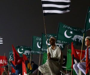 epa07740627 Supporters of opposition political parties during the rally as they observe anniversary of the general elections as 'BLACK DAY' to protest government policies, in Karachi, Pakistan, 25 July 2019. The Pakistani general elections were held on 25 July 2018 bringing Imran Khan and his Pakistan Tehreek-e-Insaf party (PTI) into power.  EPA/SHAHZAIB AKBER
