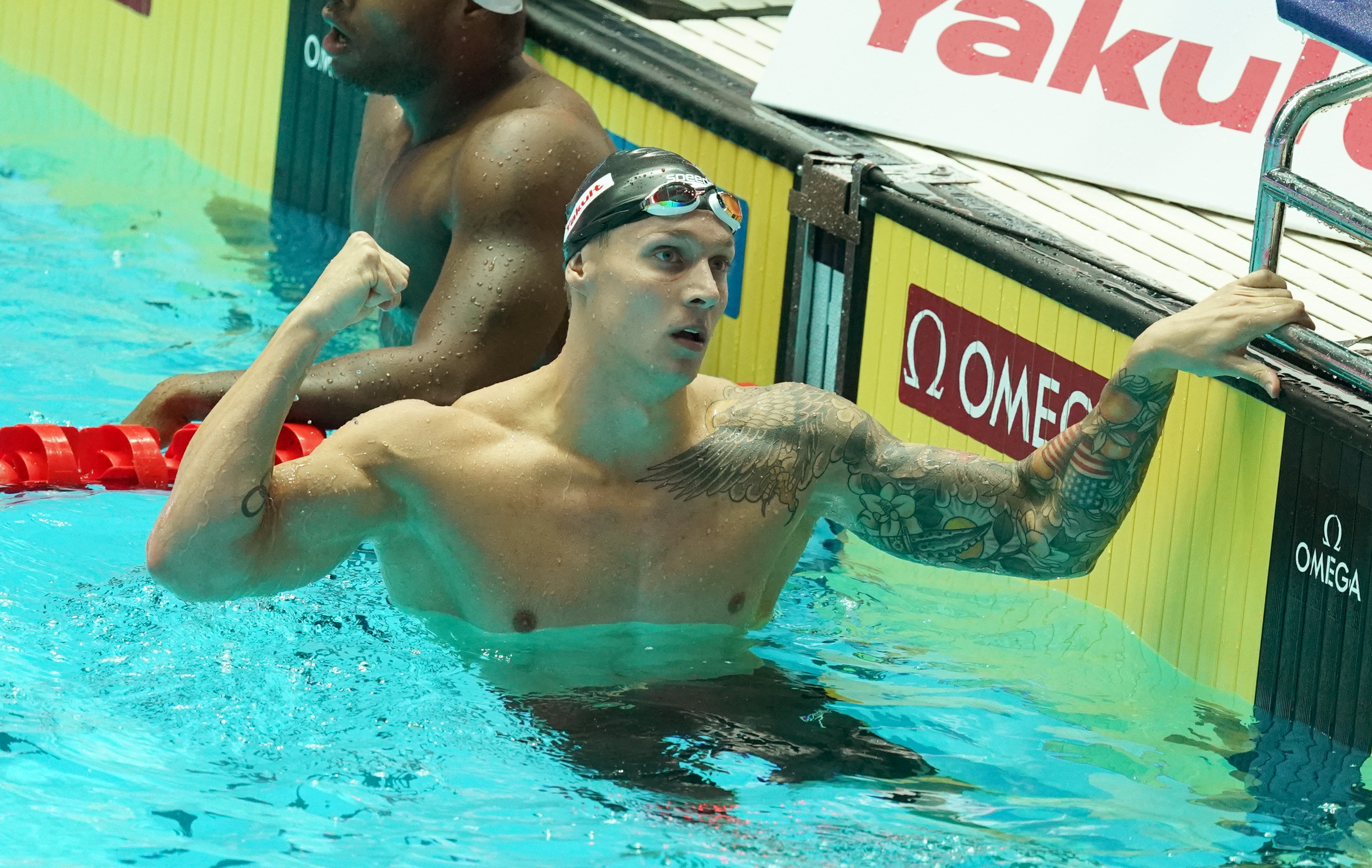 epa07741905 Caeleb Dressel of the United States of America (USA) celebrates a New World Record after competing in the men's 100m Butterfly during the Swimming events at the Gwangju 2019 FINA World Championships, Gwangju, South Korea, 26 July 2019.  EPA/ANTONIO BAT