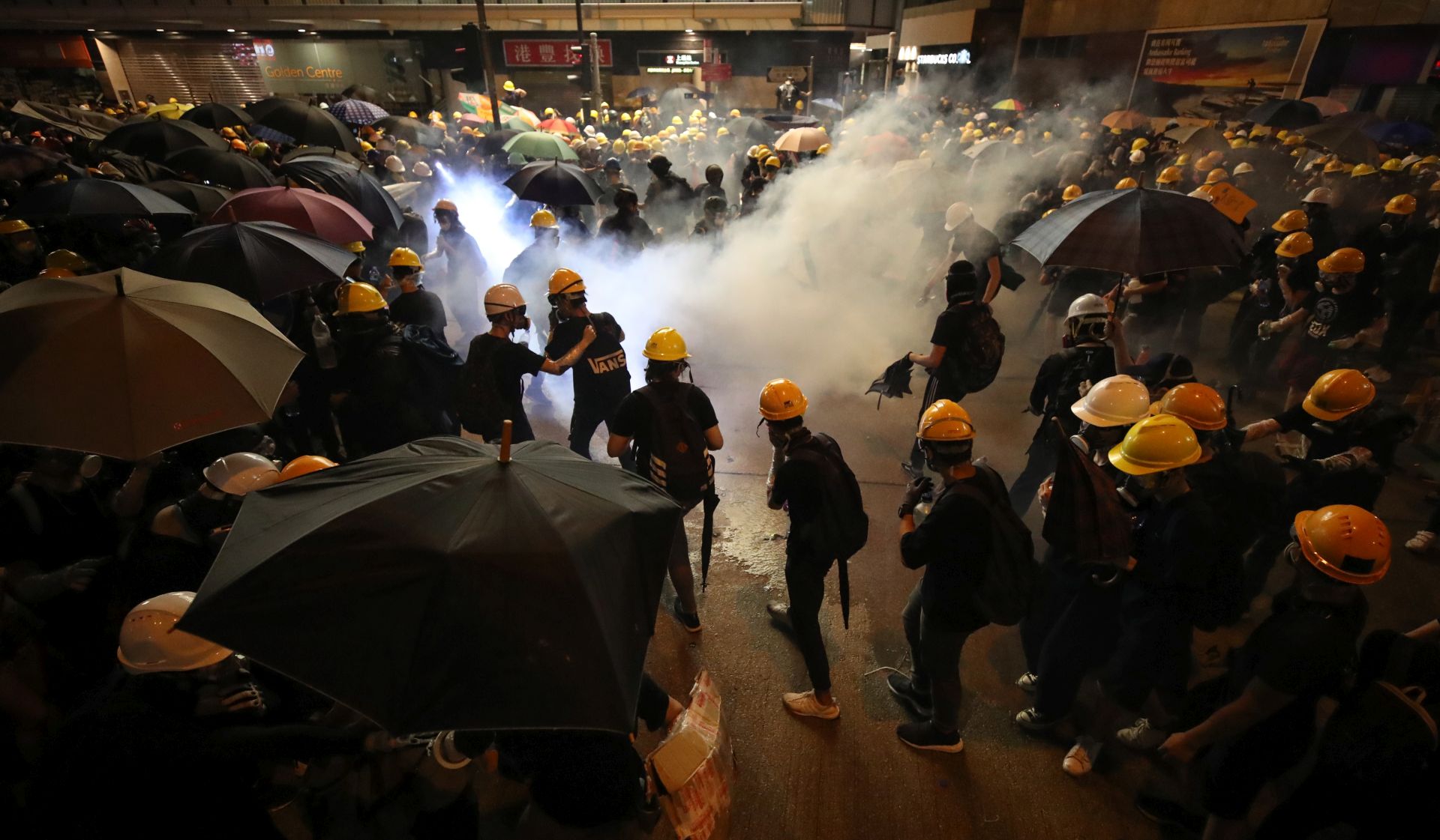 epa07745975 Anti-extradition bill protesters attend a rally against the police brutality in Hong Kong, China, 28 July 2019. Hong Kong has a new mass rally with demonstrators protesting against the police brutality on 27 July in Yuen Long, another mass protest was held and ended up with clashes between protesters and the police when riot police fired rubber bullets, tear gas and pepper spray to disperse the crowd.  EPA/RITCHIE B. TONGO