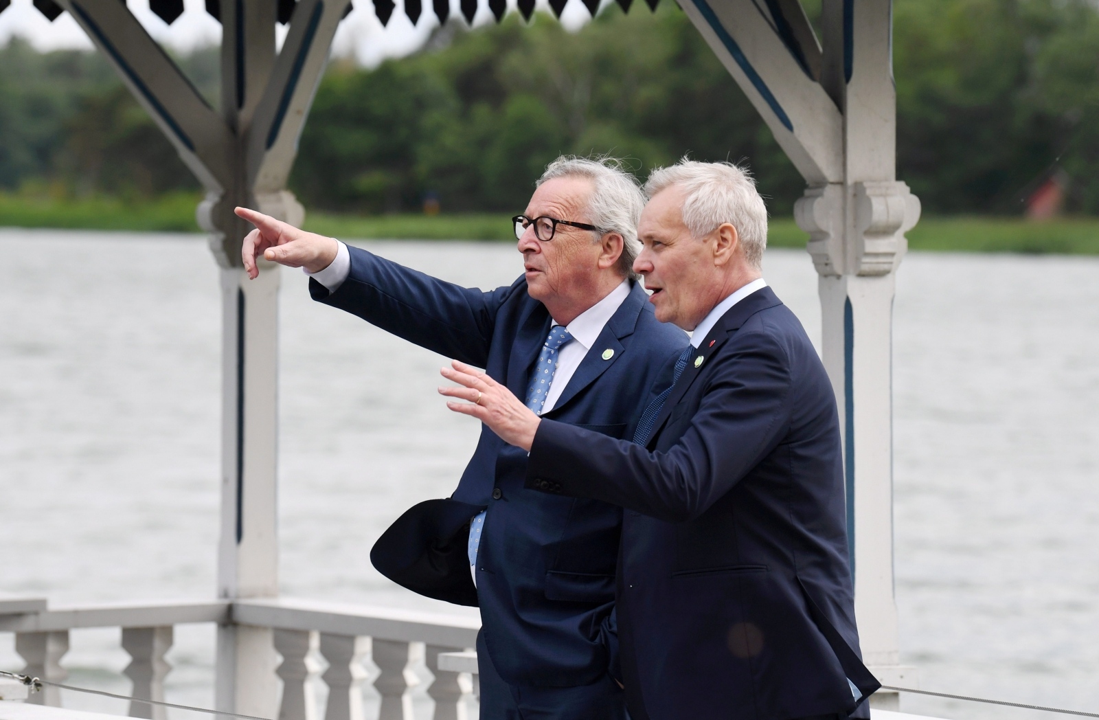 EU's Juncker visits Finland to launch EU presidency Outgoing president of the European Commission Jean-Claude Juncker (L) and Prime Minister of Finland Antti Rinne gesture during the meeting of the Finnish ministers and the commissioners at the Prime Minister's official residence Kesäranta in Helsinki, Finland July 4, 2019. Jussi Nukari/Lehtikuva/via REUTERS      ATTENTION EDITORS - THIS IMAGE WAS PROVIDED BY A THIRD PARTY. NO THIRD PARTY SALES. FINLAND OUT. LEHTIKUVA
