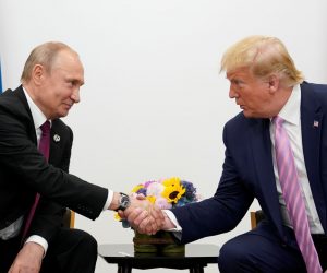 G20 leaders summit in Osaka Russia's President Vladimir Putin and U.S. President Donald Trump shake hands during a bilateral meeting at the G20 leaders summit in Osaka, Japan, June 28, 2019.  REUTERS/Kevin Lamarque KEVIN LAMARQUE