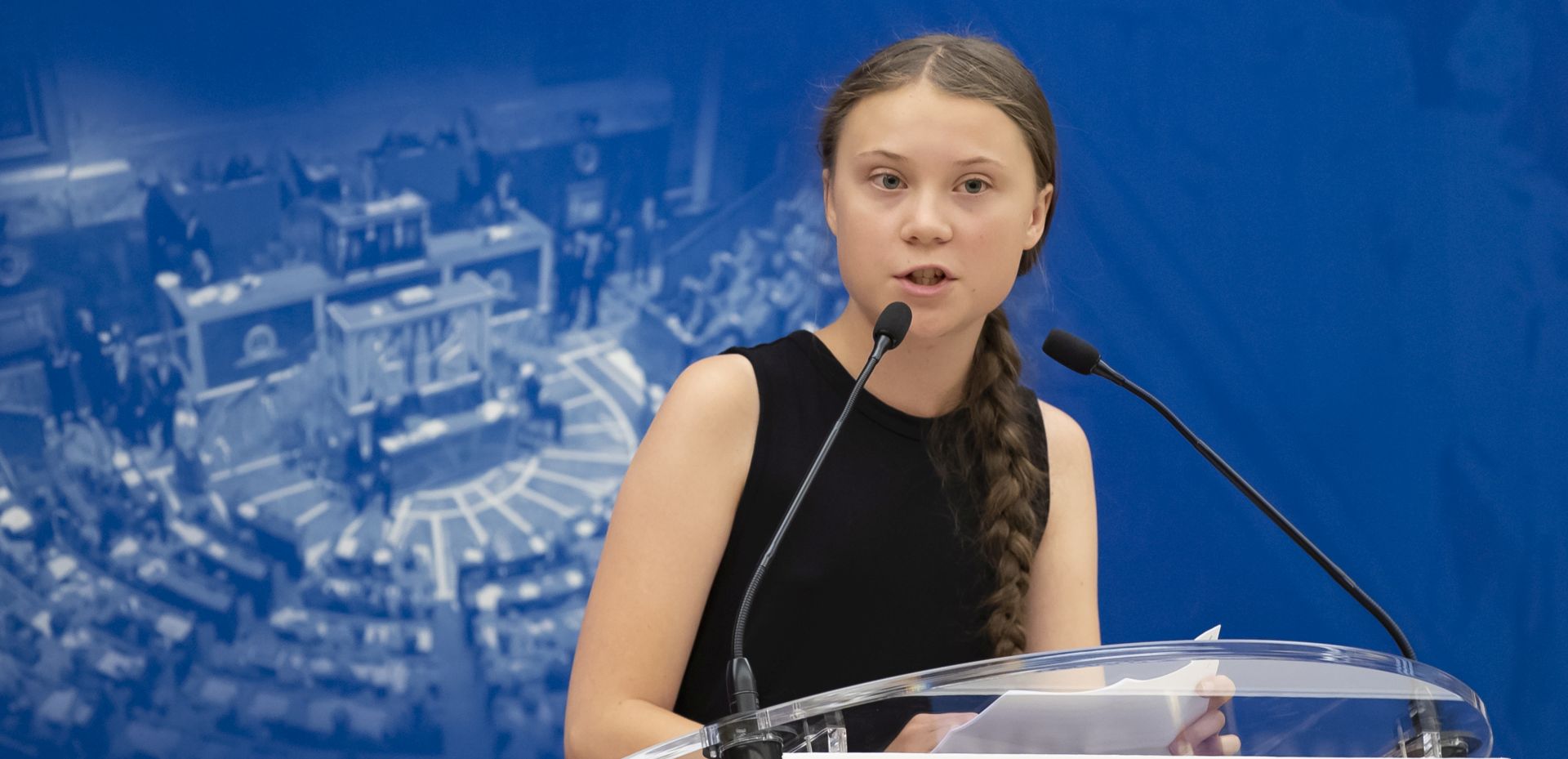 epa07735306 Swedish climate activist Greta Thunberg delivers a speech at the Assemblee Nationale, French parliament, in Paris, France, 23 July 2019. Teenage climate activist Greta Thunberg, who sparked the #FridaysForFuture school strike movement, attended a conference with young climate activists at the National Assembly.  EPA/IAN LANGSDON