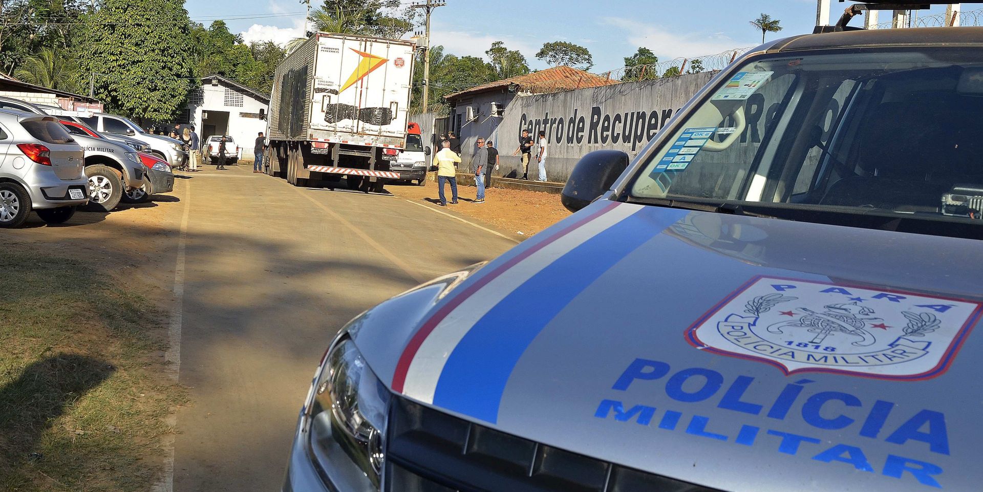 epa07748137 A refrigerated truck arrives at the Regional Recovery Center in Altamira, Para state, Brazil, 29 July 2019. A Riot that broke out on 29 July, between rival gangs at the Regional Recovery Center, has claimed the lives of more than 50 inmates.  EPA/KAIO MARCELLUS