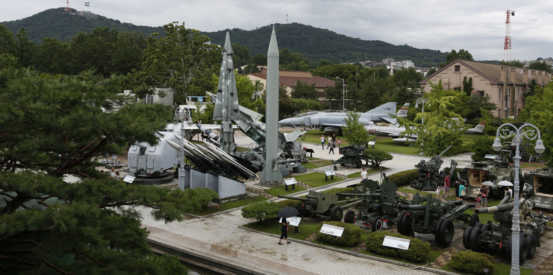 epa07749488 Peoples look at a North Korean Scud-B Tactical Ballistic Missile (C) on display at the Korean War Memorial Museum in Seoul, South Korea, 31 July 2019. According to South Korea's Joint Chiefs of Staff (JCS), North Korea fired two short-range missiles toward the East Sea from the Kalma area near the North's eastern port of Wonsan on 31 July.  EPA/JEON HEON-KYUN