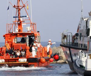 epa07755361 Maritime Rescue transfers 27 migrants to the port of Almeria after they were rescued from two boats in the Alboran Sea, in Almeria, Spain, 03 August 2019. One woman and three children were among the group that was rescued.  EPA/RICARDO GARCIA