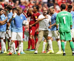 epa07756506 Manchester City's manager Pep Guardiola (C-R) reacts during the FA Community Shield soccer match between Liverpool FC and and Manchester City at Wembley Stadium in London, Britain, 04 August 2019.  EPA/WILL OLIVER EDITORIAL USE ONLY. No use with unauthorized audio, video, data, fixture lists, club/league logos or 'live' services. Online in-match use limited to 120 images, no video emulation. No use in betting, games or single club/league/player publications.