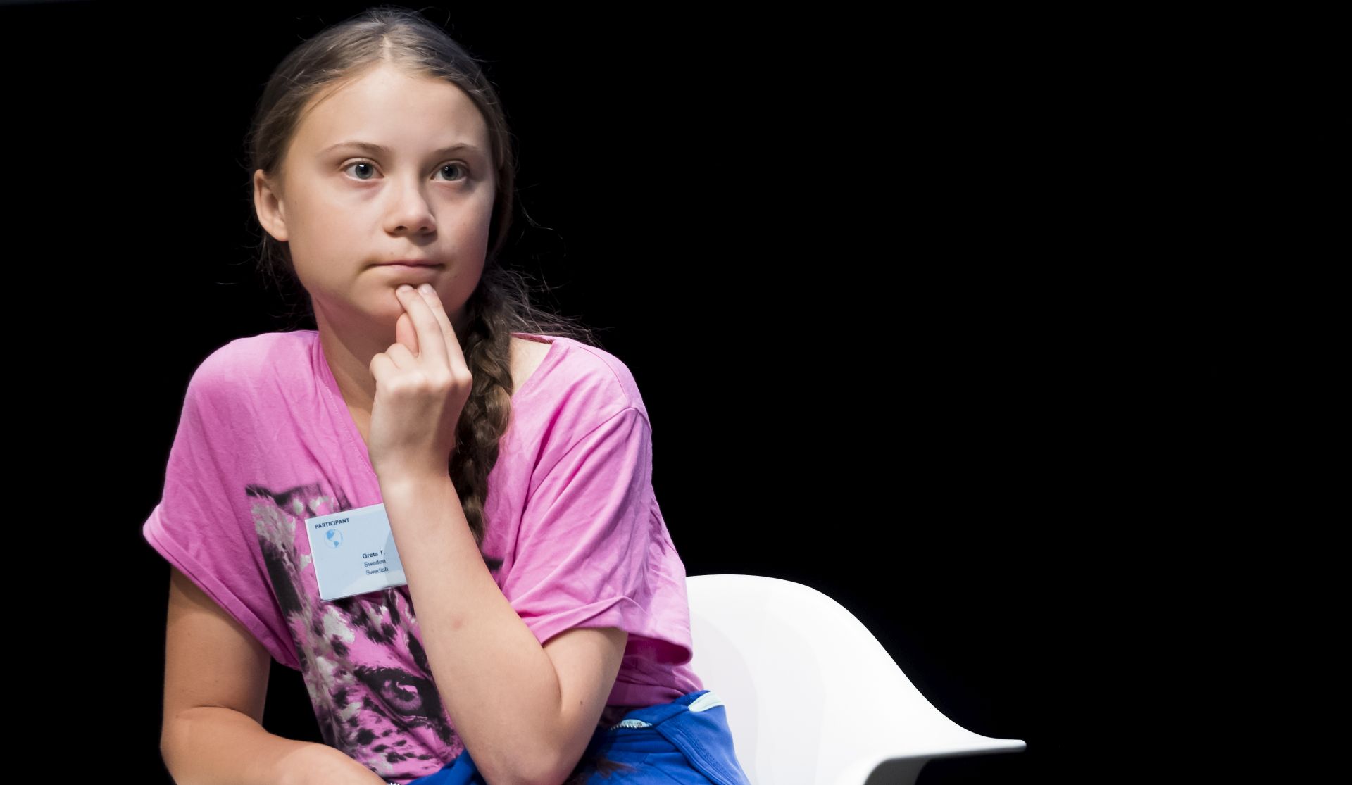 epa07757815 Swedish climate activist Greta Thunberg looks on during a press conference of the 'Fridays For Future Summit', at the University of Lausanne (UNIL), in Lausanne, Switzerland, 05 August 2019. More than 450 participants from 37 different countries will meet in Lausanne, Switzerland, from 05 to 09 August for the summer gathering of the 'Fridays for Future' movement.  EPA/JEAN-CHRISTOPHE BOTT