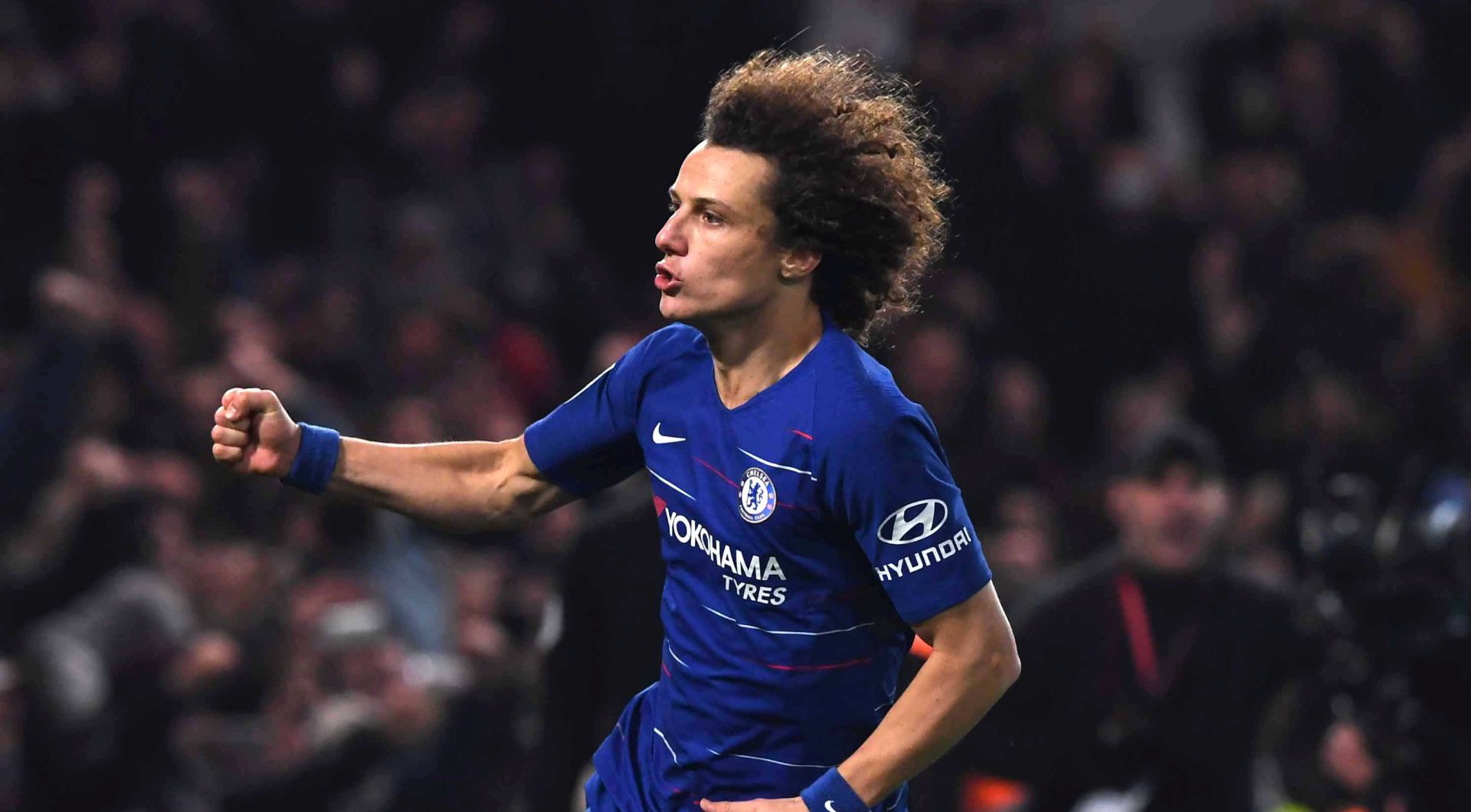 epa07761743 (FILE) - Chelsea David Luiz celebrates scoring the winning penalty during the Carabao League Cup semi final second leg soccer match between Chelsea and Tottenham Hotspur at Stamford Bridge stadium in London, Britain, 24 January 2019 (re-issued 08 August 2019). Arsenal London are said to have agreed a deal to sign David Luiz from Chelsea for a fee of around £8 million (€8,67 million) and get it through on the Premier League transfer deadline day 08 August 2019.  EPA/NEIL HALL EDITORIAL USE ONLY.  No use with unauthorized audio, video, data, fixture lists, club/league logos or 'live' services. Online in-match use limited to 120 images, no video emulation. No use in betting, games or single club/league/player publications. *** Local Caption *** 54930509