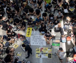 epa07763522 Protesters rally inside the arrivals hall of Hong Kong International Airport in Hong Kong, China, 09 August 2019. Protesters were gathering at the airport for a three-day sit-in to protest against a now-suspended extradition bill and call for universal suffrage, and to raise awareness among international visitors to Hong Kong of claims of police brutality.  EPA/JEROME FAVRE