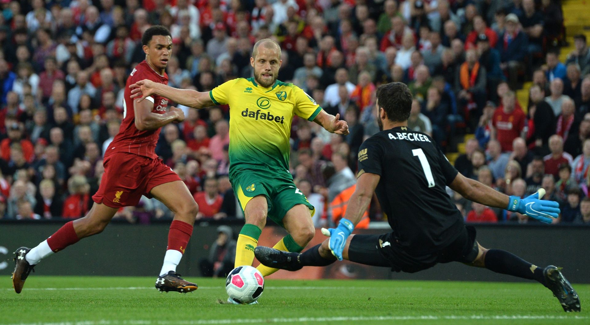 epa07764830 Teemu Pukki (C) of Norwich City  in action during the English Premier League soccer match between Liverpool FC and Norwich City at Anfield, Liverpool, Britain, 09 August 2019.  EPA/PETER POWELL EDITORIAL USE ONLY. No use with unauthorized audio, video, data, fixture lists, club/league logos or 'live' services. Online in-match use limited to 120 images, no video emulation. No use in betting, games or single club/league/player publications