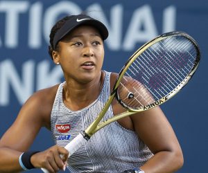 epa07765214 Naomi Osaka of Japan in action against Serena Williams of the USA during their quarterfinals match at the Rogers Cup tennis tournament in Toronto, Canada, 09 August 2019.  EPA/WARREN TODA