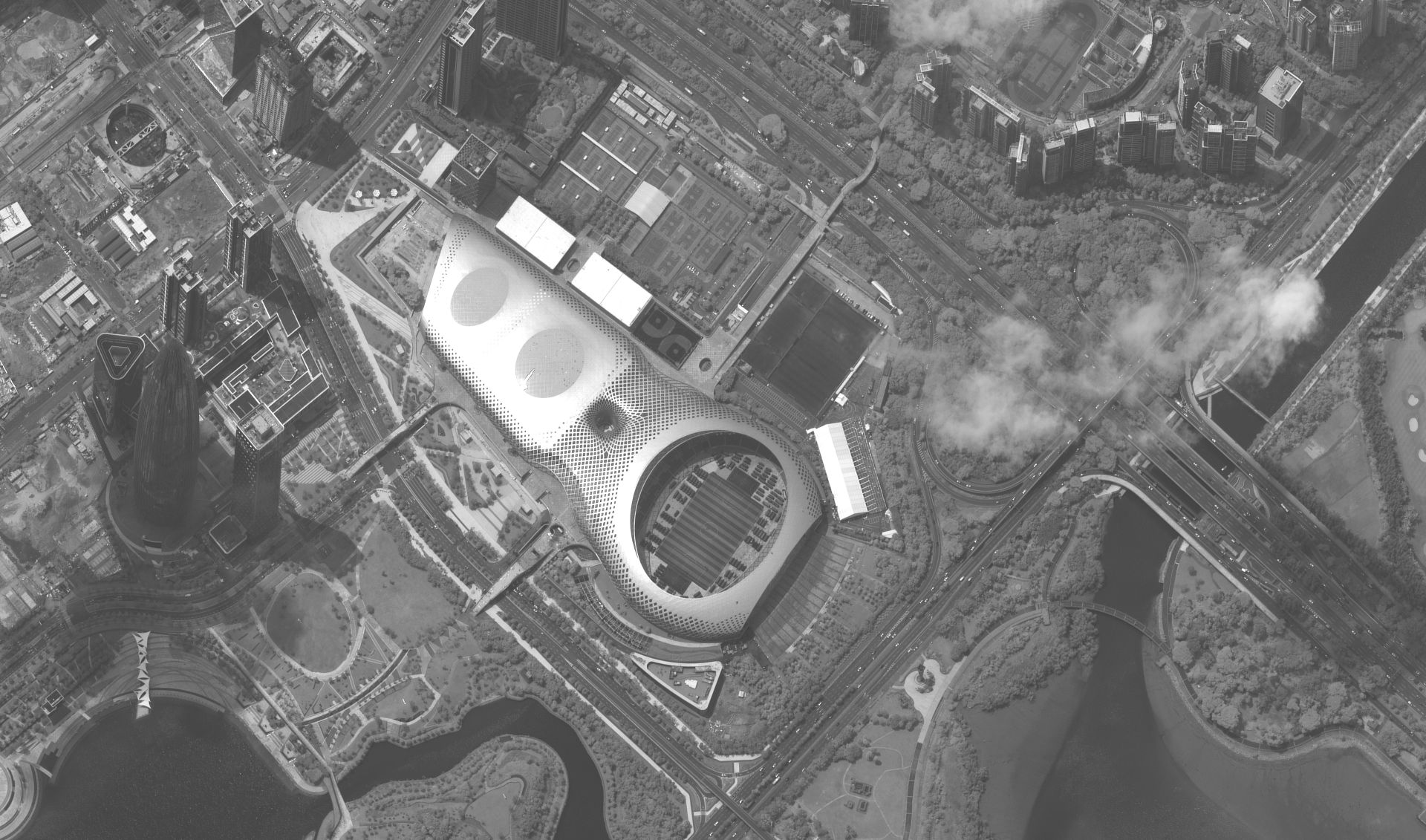 epa07772212 A handout satellite image made available by Maxar Technologies shows military and security vehicles parked in the Shenzhen Bay Sports Center, in Shenzhen, China, 12 August 2019 (issued 14 August 2019). According to media reports, military and security vehicles from the People's Armed Police have gathered in Shenzhen, a city in southeastern China which borders Hong Kong. The special administrative region of Hong Kong has been gripped for weeks by mass protests, which began in June 2019 over a now-suspended extradition bill and have developed into an anti-government movement.  EPA/SATELLITE IMAGE ©2019 MAXAR TECHNOLOGIES / HANDOUT MANDATORY CREDIT: SATELLITE IMAGE ©2019 MAXAR TECHNOLOGIES - The watermark may not be removed/cropped HANDOUT EDITORIAL USE ONLY/NO SALES