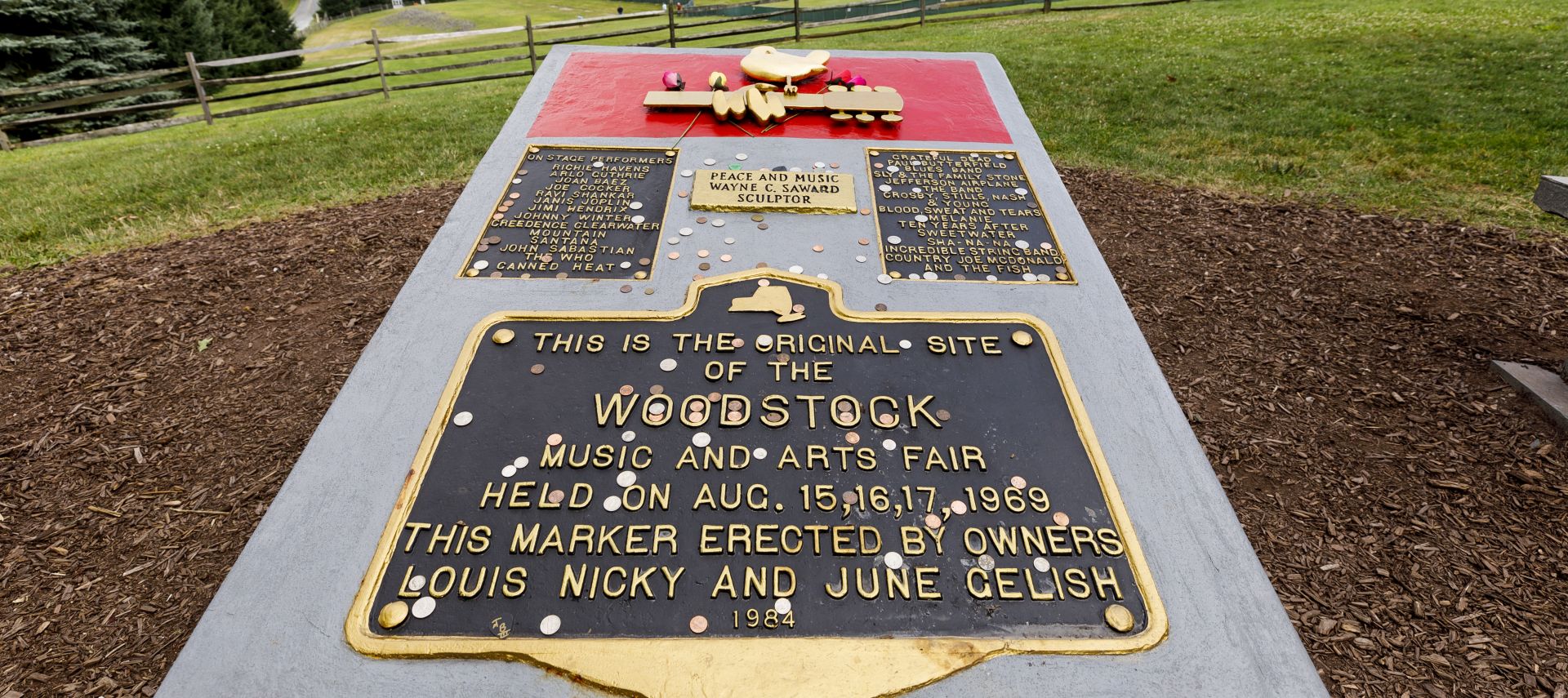 epa07773937 The plaque marking the Woodstock Festival Monument, located at the site of the original Woodstock festival, in Bethel, New York, USA, 14 August 2019. The land, which was once farm land owned by Max Yasgur and is now shared by Bethel Woods Center for the Arts, was the site of the famous concert on 15, 16 and 17 August 1969.  EPA/JUSTIN LANE