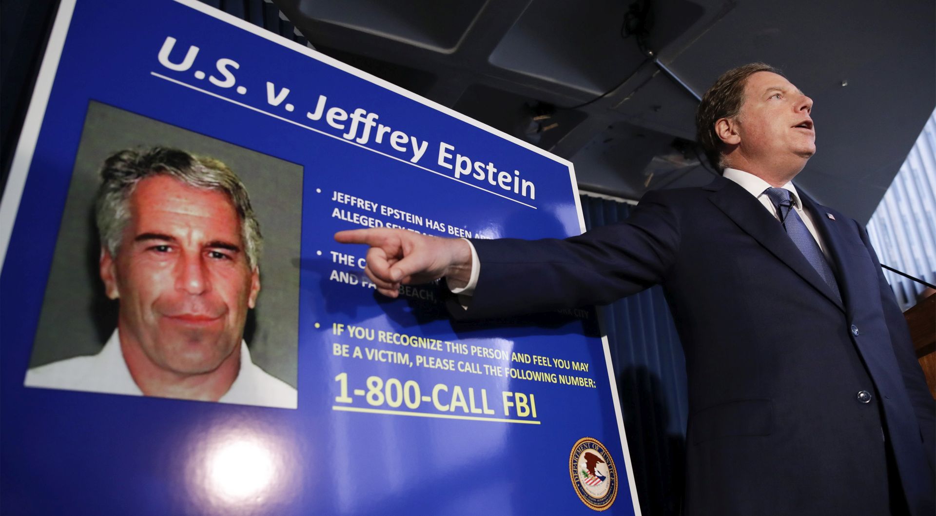 epa07766214 (FILE) - United States Attorney for the Southern District of New York Geoffrey Berman (R) points as he speaks during a news conference about the arrest of American financier Jeffrey Epstein in New York, USA, 08 July 2019 (reissued 10 August 2019). US media reported that Epstein was found dead in his prison cell on 10 August 2019 morning in the MCC Manhattan while awaiting trial on sex trafficking charges. An official confirmation by authorities of his death is pending.  EPA/JASON SZENES
