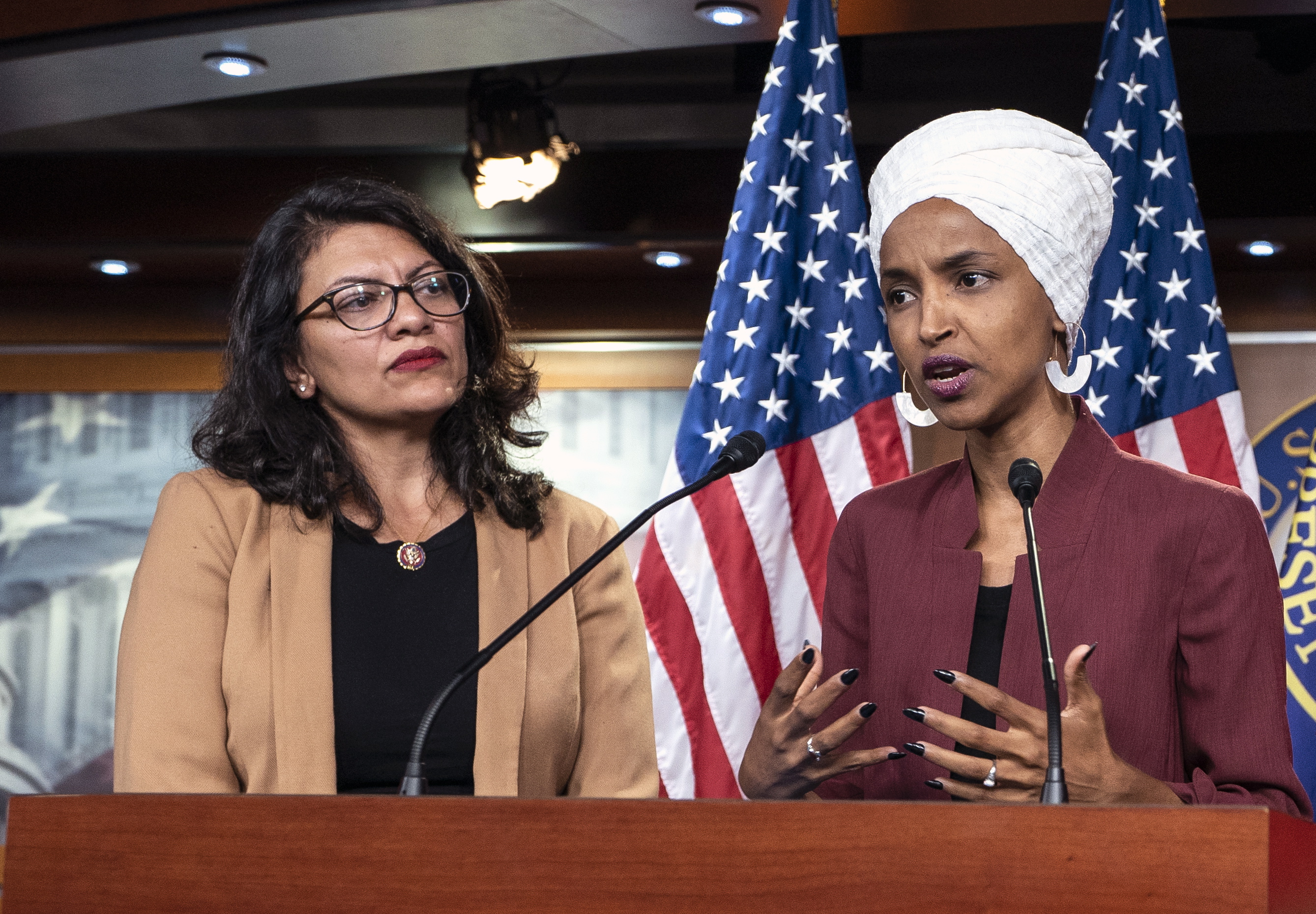 epa07774972 (FILE) - Democratic Representatives Ilhan Omar (R) and Rashida Tlaib speak about President Trump's Twitter attacks against them in the US Capitol in Washington, DC, USA, 15 July 2019 (reissued 15 August 2019). According to media reports, US Democratic congresswomen Rashida Tlaib and Ilhan Omar have been banned from entering Israel over an anti-Israel boycott movement.  EPA/JIM LO SCALZO