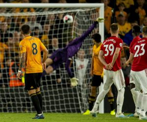 epa07781426 Wolverhampton Wanderers Ruben Neves (L) scores during the English Premier League soccer match between Wolverhampton Wanderers and Manchester United held at the Molineux in Wolverhampton, Britain, 19 August 2019.  EPA/PETER POWELL EDITORIAL USE ONLY. No use with unauthorized audio, video, data, fixture lists, club/league logos or 'live' services. Online in-match use limited to 120 images, no video emulation. No use in betting, games or single club/league/player publications