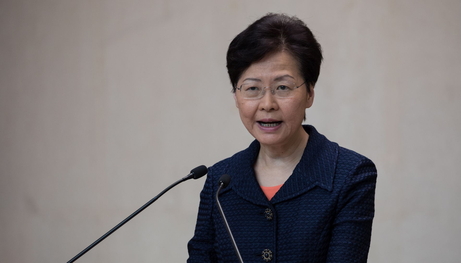 epa07781589 Hong Kong Chief Executive Carrie Lam Cheng Yuet-ngor speaks during a media briefing before the weekly executive council meeting in Hong Kong, China, 20 August 2019. Lam said her administration would immediately work on setting up a means of finding a solution to the civil unrest triggered by her massively unpopular extradition bill.  EPA/JEROME FAVRE