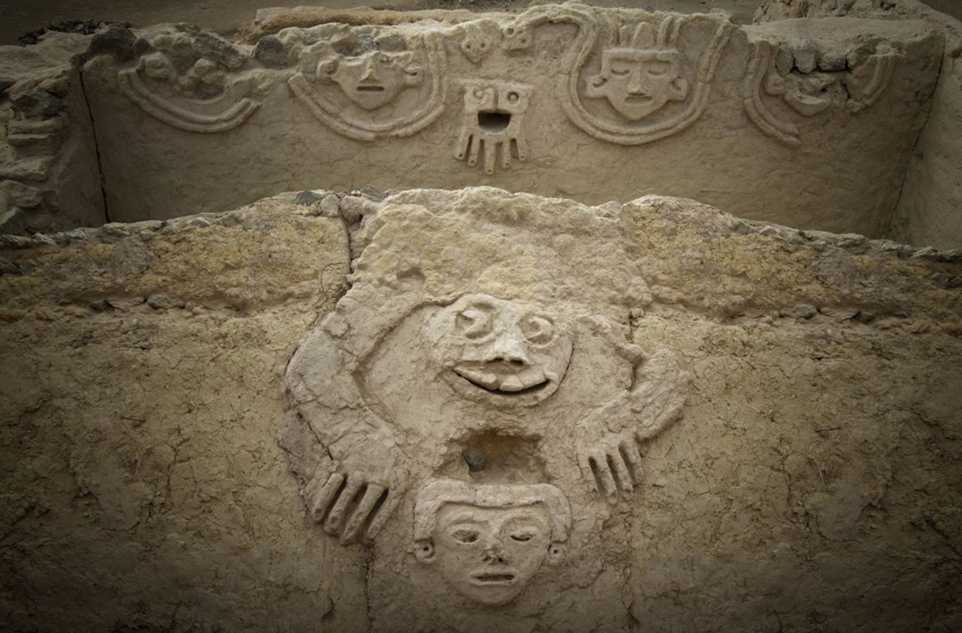 epa07781532 An undated handout photo made available by Archaeological Area Caral shows a humanized toad and an anthropomorphic head, discovered in one of the buildings of the civilization of Caral, north of Lima, Peru, Issued 19 August 2019. A humanized toad and an anthropomorphic head are the new reliefs of some 3,800 years old discovered in one of the buildings of the civilization of Caral, the oldest in America known so far, which developed in the valleys of northern Lima.  EPA/Archaeological Area Caral HANDOUT  HANDOUT EDITORIAL USE ONLY/NO SALES
