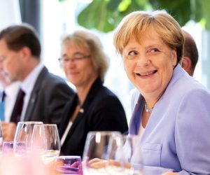 epa07785478 German Chancellor Angela Merkel (R), during a working lunch at the Catshuis on climate change in The Hague, The Netherlands, 22 August 2019.  EPA/REMKO DE WAAL