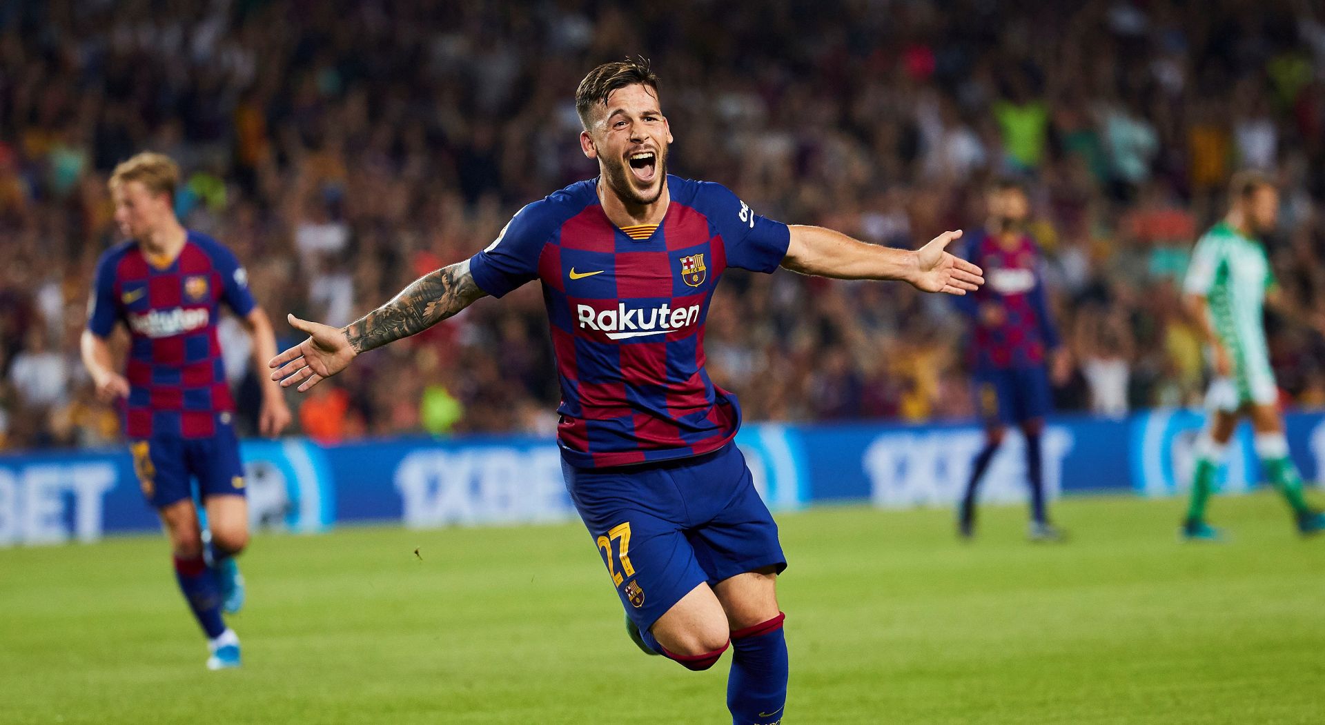 epa07794134 FC Barcelona's forward Carles Perez celebrates after scoring the 3-1 during the Spanish LaLiga match between FC Barcelona and Real Betis at Camp Nou stadium in Barcelona, Catalonia, Spain, 25 August 2019.  EPA/ALEJANDRO GARCIA