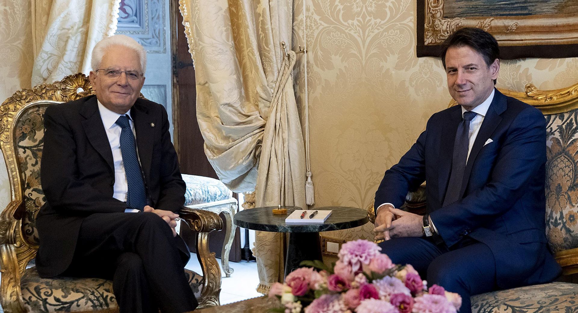 epa07800600 A handout photo made available by the Quirinal Press Office shows Italian Prime Minister Giuseppe Conte (R) and Italian President Sergio Mattarella (L) during their meeting at the Quirinal Palace in Rome, Italy, 29 August 2019. Outgoing premier Giusppe Conte is set to get a fresh mandate to try to form a new government majority with the anti-establishment 5-Star Movement (M5S) and the centre-left Democratic Party (PD) replacing the M5S-League administration which nationalist League leader Matteo Salvini brought down earlier this month.  EPA/PAOLO GIANDOTTI / QUIRINAL PRESS OFFICE / HANDOUT  HANDOUT EDITORIAL USE ONLY/NO SALES