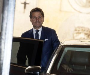 epa07800886 Designated Italian Prime Minister Giuseppe Conte leaves the Senate to go to the Chamber of Deputies, Rome, Italy, 29 August 2019. Sergio Mattarella handed outgoing Premier Giuseppe Conte a mandate to form a government. Conte, as is the usual practice, reserved the right to accept the mandate pending talks with the two parties supporting the government bid, the anti-establishment 5-Star Movement (M5S) and the centre-left Democratic Party (PD).  EPA/MASSIMO PERCOSSI