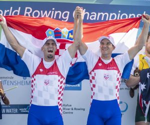 epa07806691 Gold medalists Martin (L) and Valent Sinkovic of Croatia celebrate after winning the Men's Pair Final A at the World Rowing Championship 2019 in Linz-Ottensheim, Austria, 31 August 2019.  EPA/CHRISTIAN BRUNA