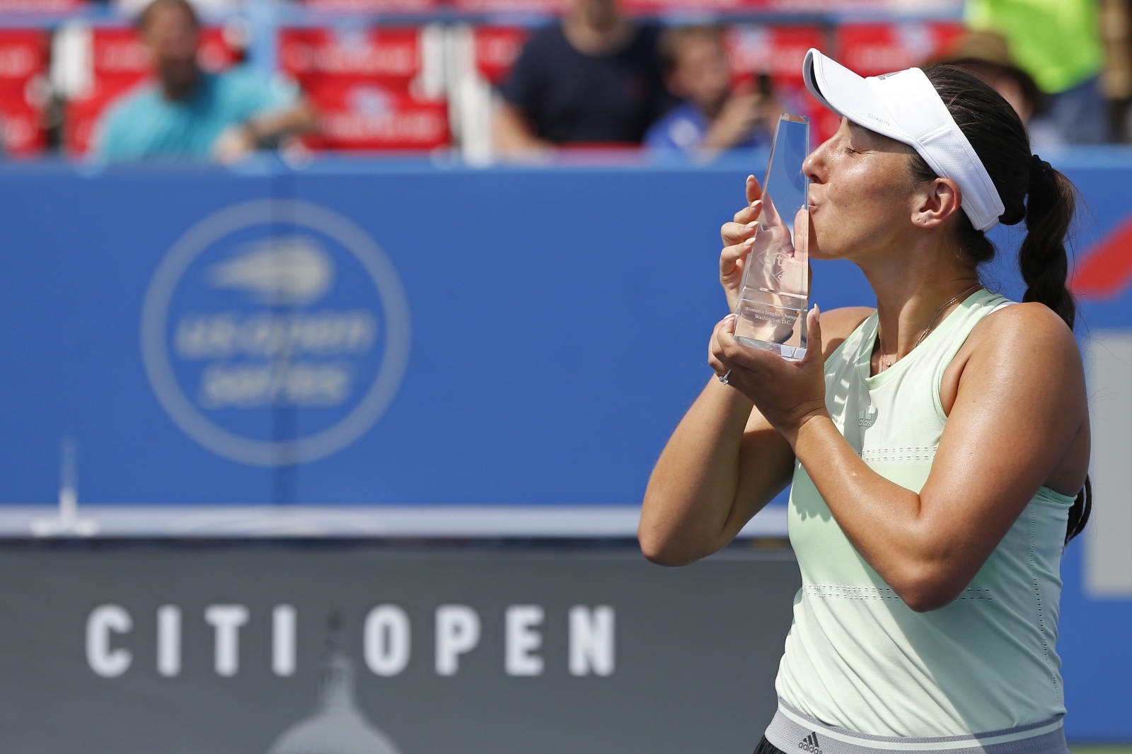 Tennis: Citi Open Aug 4, 2019; Washington, D.C., USA; Jessica Pegula of the United States kisses the championship trophy after her match against Camila Giorgi of Italy (not pictured) in the womenÕs singles final at William H.G. FitzGerald Tennis Center. Mandatory Credit: Geoff Burke-USA TODAY Sports Geoff Burke