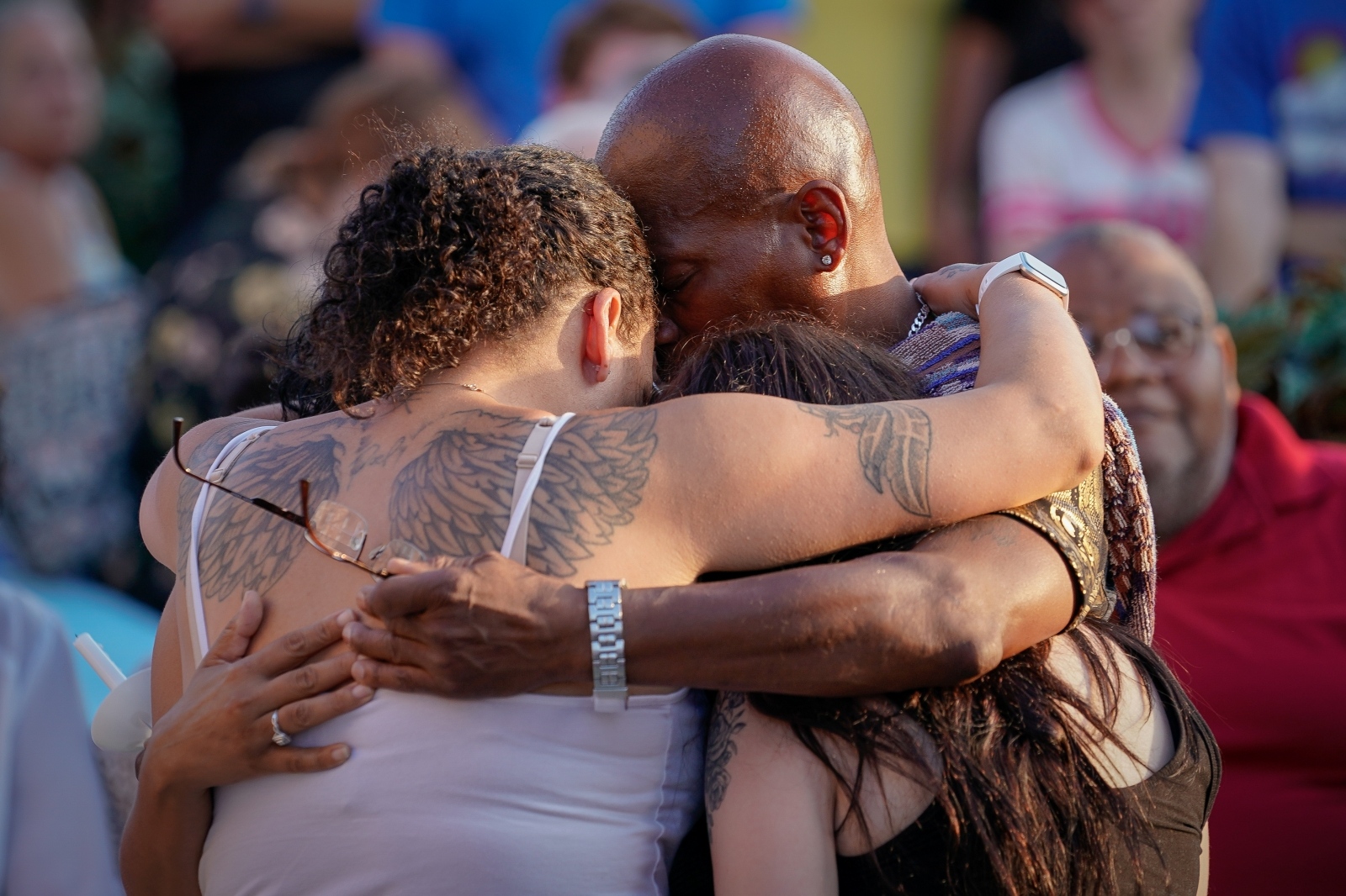 Family and friends of Derek Fudge, who was killed in a mass shooting early Sunday morning in Dayton, Ohio, hug during a memorial service in Springfield Family and friends of Derek Fudge, who was killed in a mass shooting early Sunday morning in Dayton, Ohio, hug during a memorial service  in Springfield, Ohio, U.S. August 5, 2019.  REUTERS/Bryan Woolston Bryan Woolston