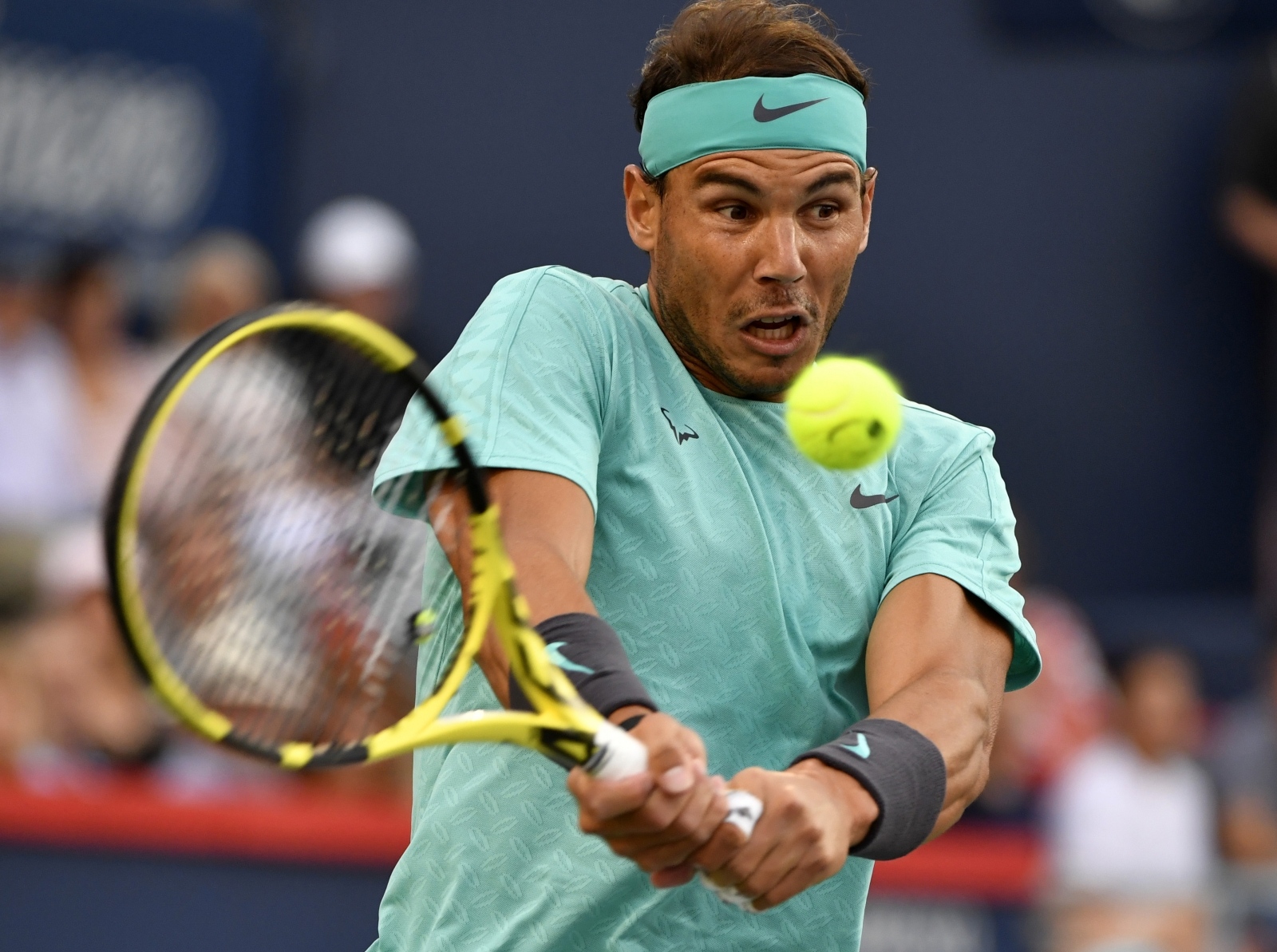 Tennis: Rogers Cup Aug 9, 2019; Montreal, Quebec, Canada; Rafael Nadal of Spain hits a shot against Fabio Fognini of Italy (not pictured) during the Rogers Cup tennis tournament at Stade IGA. Mandatory Credit: Eric Bolte-USA TODAY Sports Eric Bolte