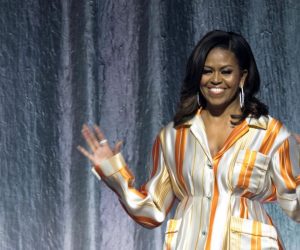 Former first lady Michelle Obama visits Paris to promote her book "Becoming Former first lady Michelle Obama waves on stage at the AccorHotels Arena during a book tour to promote her memoir "Becoming" in Paris, France, April 16, 2019.  REUTERS/Charles Platiau CHARLES PLATIAU