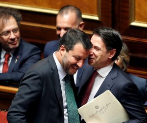 Italian Prime Minister Giuseppe Conte addresses the upper house of parliament over the ongoing government crisis, in Rome Italian Prime Minister Giuseppe Conte speaks with Italian Deputy PM Matteo Salvini before addressing the upper house of parliament over the ongoing government crisis, in Rome, Italy August 20, 2019. REUTERS/Yara Nardi     TPX IMAGES OF THE DAY YARA NARDI