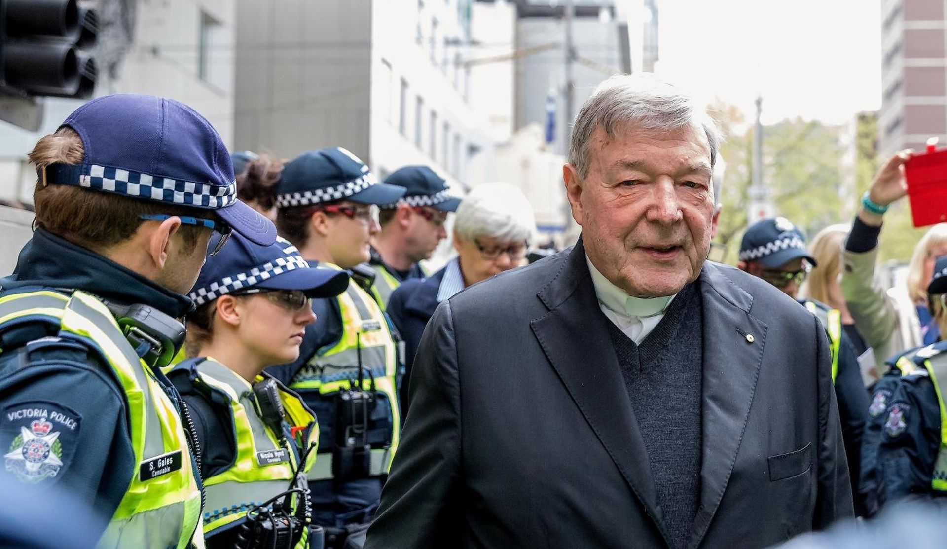 FILE PHOTO - Vatican Treasurer Cardinal George Pell is surrounded by Australian police as he leaves the Melbourne Magistrates Court in Australia FILE PHOTO - Vatican Treasurer Cardinal George Pell is surrounded by Australian police as he leaves the Melbourne Magistrates Court in Australia, October 6, 2017.    REUTERS/Mark Dadswell/File Photo Mark Dadswell