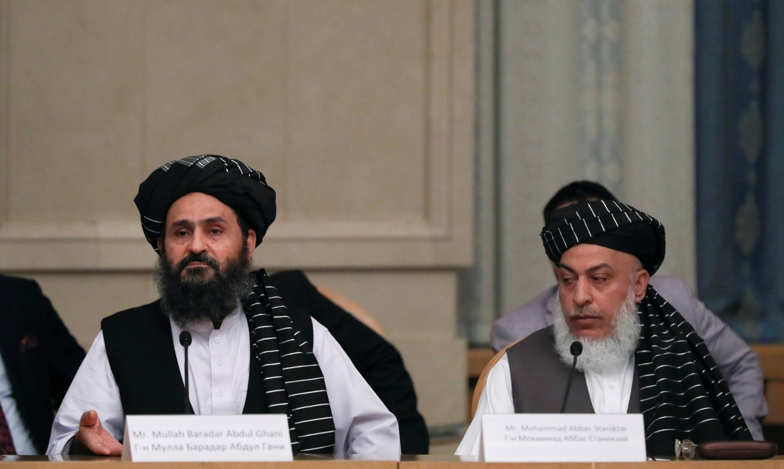 Officials attend peace talks between Afghan senior politicians and a Taliban delegation in Moscow Head of Political Office of Taliban Mohammad Abbas Stanikzai (R) and chief negotiator Mullah Abdul Ghani Baradar attend peace talks with Afghan senior politicians in Moscow, Russia May 30, 2019. REUTERS/Evgenia Novozhenina EVGENIA NOVOZHENINA