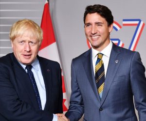 epa07790424 British Prime Minister Boris Johnson (L) shakes hands with Prime Minister of Canada Justin Trudeau ahead of a bilateral meeting in Biarritz, France, 24 August 2019. The French southwestern seaside resort of Biarritz is hosting the 45th G7 summit from August 24 to 26.  EPA/JEFF J MITCHELL / POOL