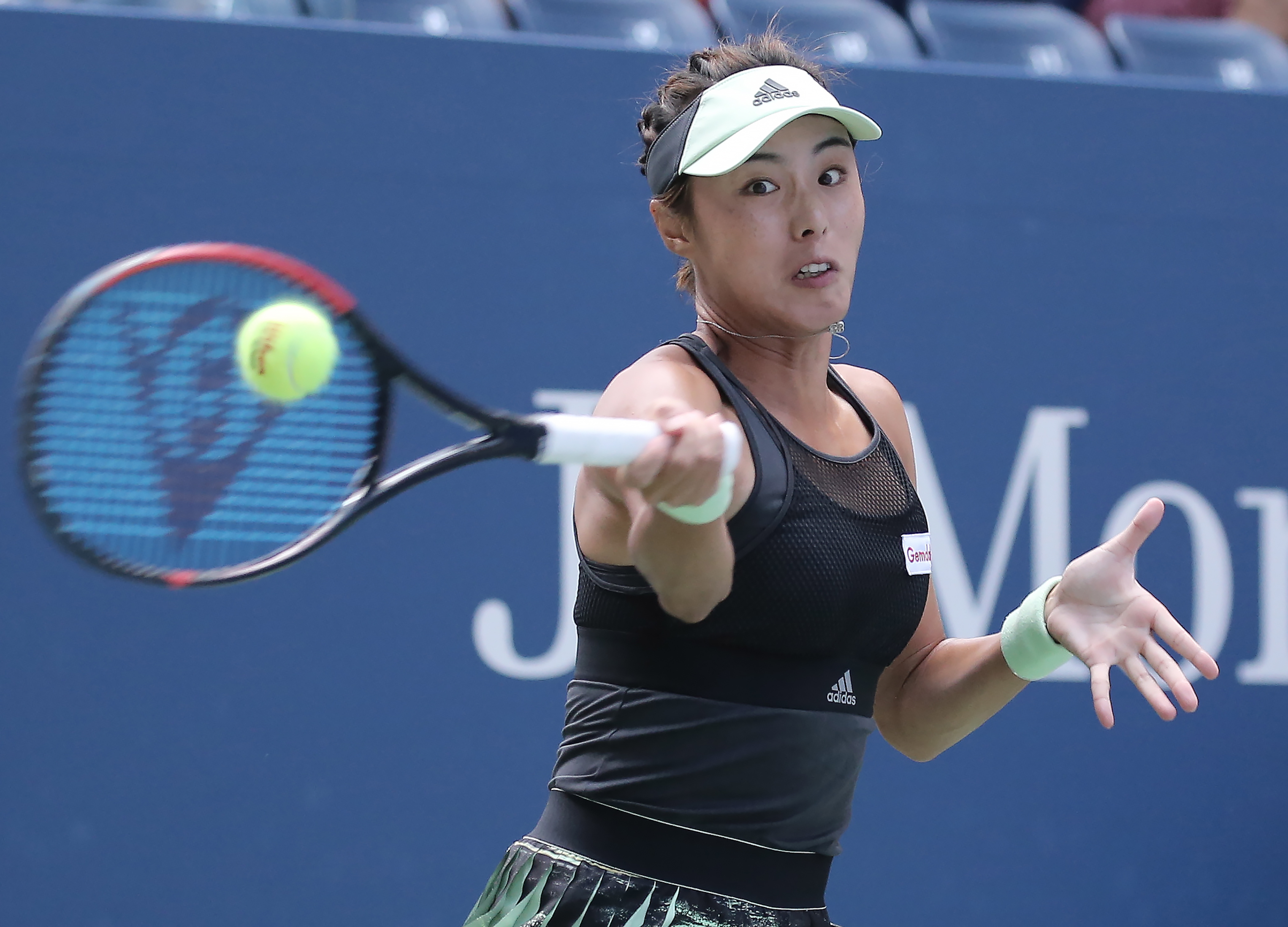 epa07810781 Qiang Wang of China hits a return to Ashleigh Barty of Australia during their match on the seventh day of the US Open Tennis Championships the USTA National Tennis Center in Flushing Meadows, New York, USA, 01 September 2019. The US Open runs from 26 August through 08 September.  EPA/PETER FOLEY