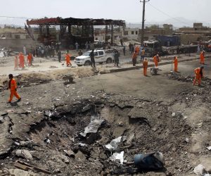 epa07814172 People inspect a destroyed oil pump station a day after a truck bomb blast, which targeted Green Village compound in Kabul, Afghanistan, 03 September 2019. At least 16 people were killed and 119 others were wounded in a truck bomb attack in the east of Kabul, at a residential area for foreign nationals, spokesman for the Ministry of Interior Nusrat Rahimi said.  EPA/HEDAYATULLAH AMID