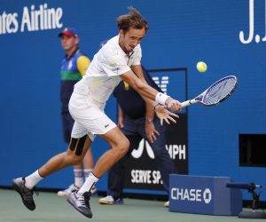 epa07815407 Daniil Medvedev of Russia hits a return to Stan Wawrinka of Switzerland during their quarter-finals round match on the ninth day of the US Open Tennis Championships the USTA National Tennis Center in Flushing Meadows, New York, USA, 03 September 2019. The US Open runs from 26 August through 08 September.  EPA/JOHN G. MABANGLO