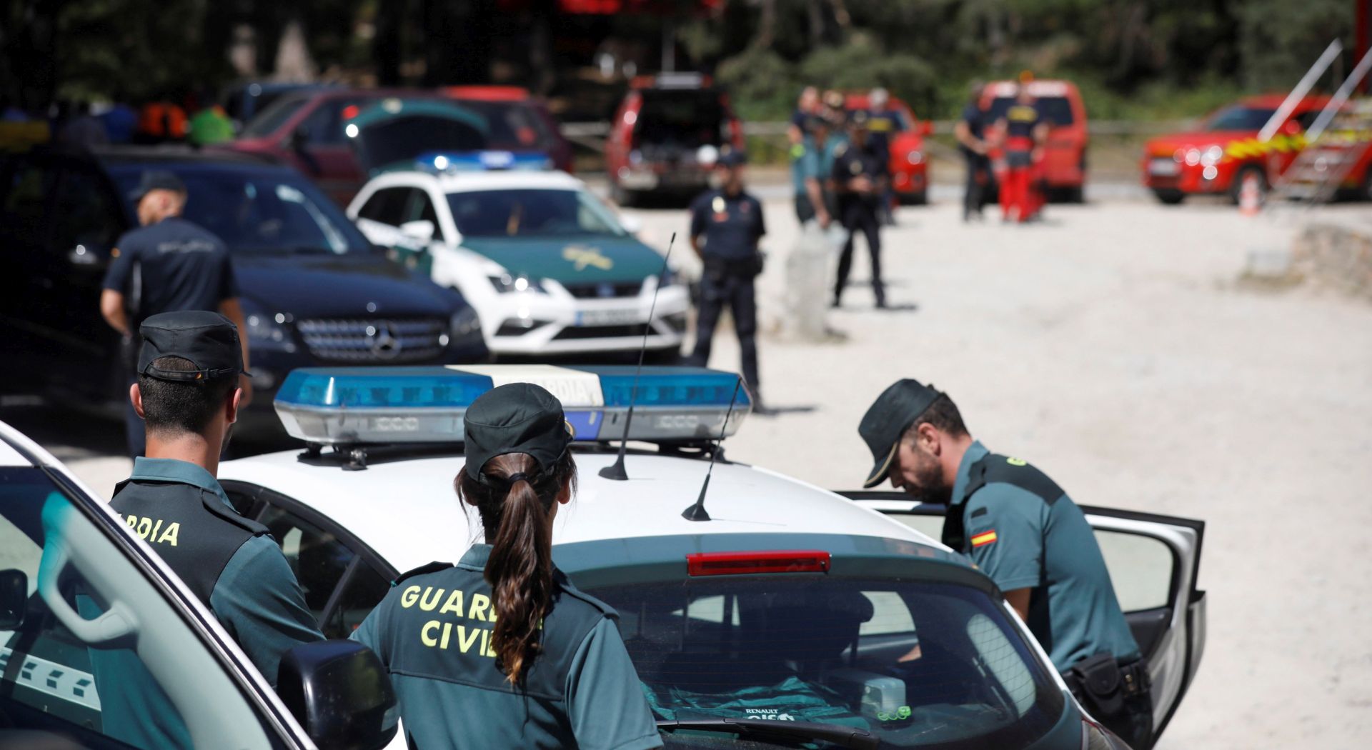 epa07816790 panish Civil Guards in Cercedilla, Madrid, Spain, after the body of Spanish Olympic medalist Blanca Fernandez Ochoa was found nearby 04 September 2019. The body of Blanca Fernandez Ochoa was found 04 September 2019, in the mountains in La Penota, a mountain peak near Los Molinos days after she went missing 23 August 2019 after leaving her sister's home in Aravaca. Finally her car was found 01 September 2019 in a parking lot in the mountains where the police found her ID card, her driving license and 15 euros.  EPA/David Fernandez