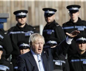 epa07820494 British Prime Minister Boris Johnson (C) delivers a speech to student police officers at the West Yorkshire Police Training Centre in Wakefield, Britain, 05 September 2019. According to reports, Prime Minster Johnson's six-week-old premiership was thrown into yet more disarray after his brother, Jo Johnson, quit the government in protest at his Brexit strategy.  EPA/DARREN STAPLES / POOL