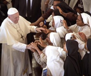epa07825023 Pope Francis (L) is greeted by nuns during his visit at the Discalced Carmelite Nuns monastery in Antananarivo, Madagascar, in Antananarivo, Madagascar, 07 September 2019. Pope Francis is on a three-nation trip to Mozambique, Madagascar and Mauritius from 04 to 10 September 2019.  EPA/LUCA ZENNARO