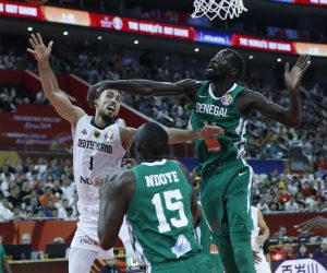 epa07825123 Ismet Akpinar of Germany (L) in action against Mouhammad Faye of Senegal (R) during the FIBA Basketball World Cup 2019 classification ​round​ match between Germany and Senegal in Shanghai, China, 07 September 2019.  EPA/WU HONG