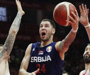 epa07827752 Stefan Jovic (C) of Serbia in action during the FIBA Basketball World Cup 2019 match between Spain and Serbia in Wuhan, China, 08 September 2019.  EPA/MADE NAGI
