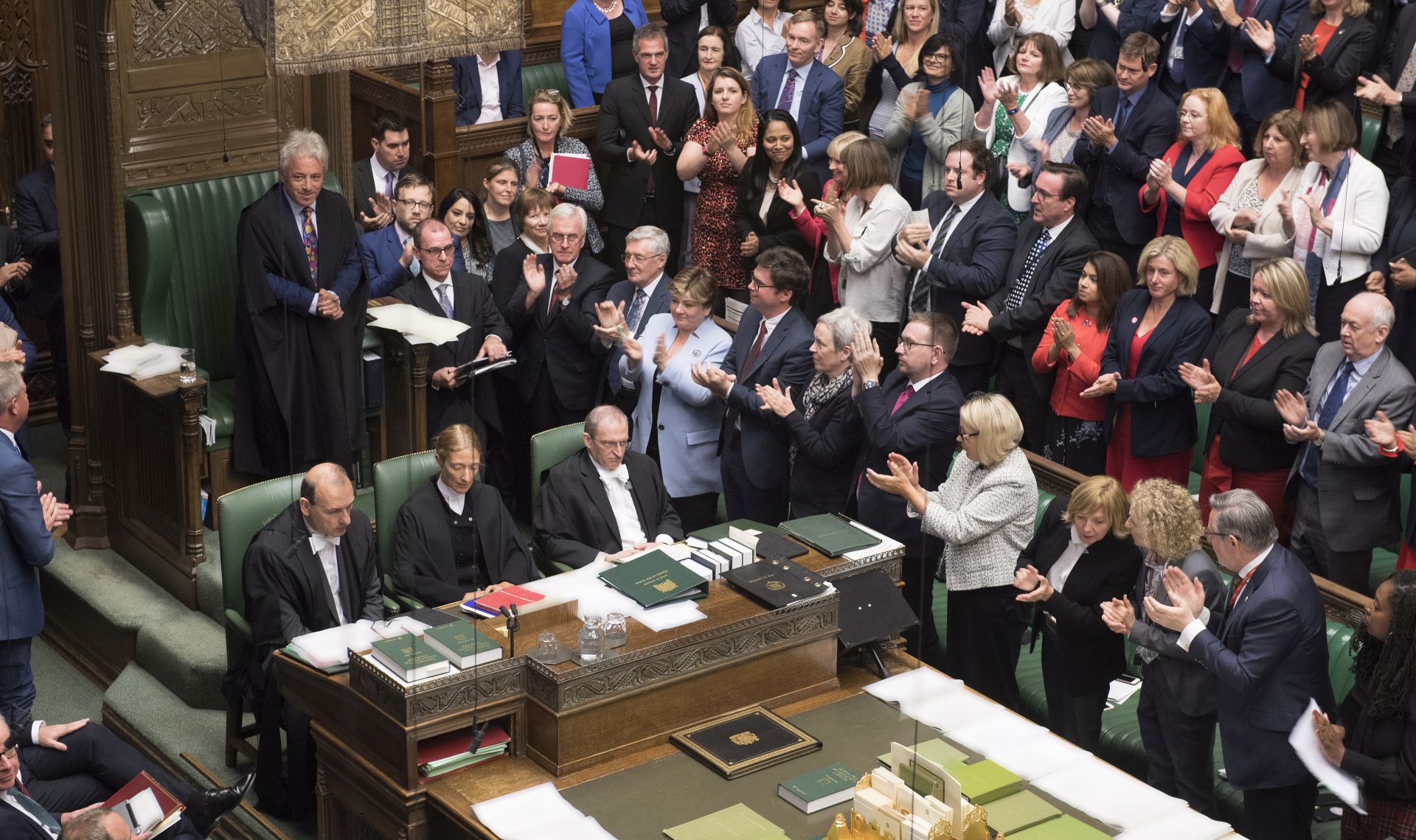 epa07830698 A handout photo made available by the UK Parliament shows Speaker of the House of Commons John Bercow (3-L) being applauded in the House of Commons in London, Britain, 09 September 2019. Reports state that John Bercow says he will stand down as Commons Speaker and Member of Parliament at the next election or on 31 October 2019, whichever comes first.  EPA/JESSICA TAYLOR/UK PARLIAMENT / HANDOUT MANDATORY CREDIT: UK PARLIAMENT / JESSICA TAYLOR HANDOUT EDITORIAL USE ONLY/NO SALES