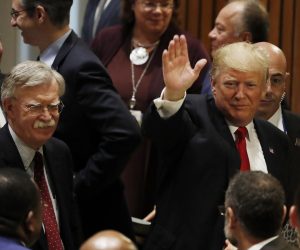epa07832877 (FILE) - US President Donald Trump (R) waves as he departs with US National Security Advisor John Bolton (2L) and US Secretary of State Mike Pompeo (L) after speaking during a US-organized high-level event on Counter Narcotics in the 73rd session of the General Assembly of the United Nations at United Nations Headquarters in New York, New York, USA, 24 September 2018 (Reissued 10 September 2019). Trump tweeted on 10 September 2019 that he asked his national security advisor John Bolton to resign and that he will name a new advisor on the following week.  EPA/JASON SZENES *** Local Caption *** 54649382