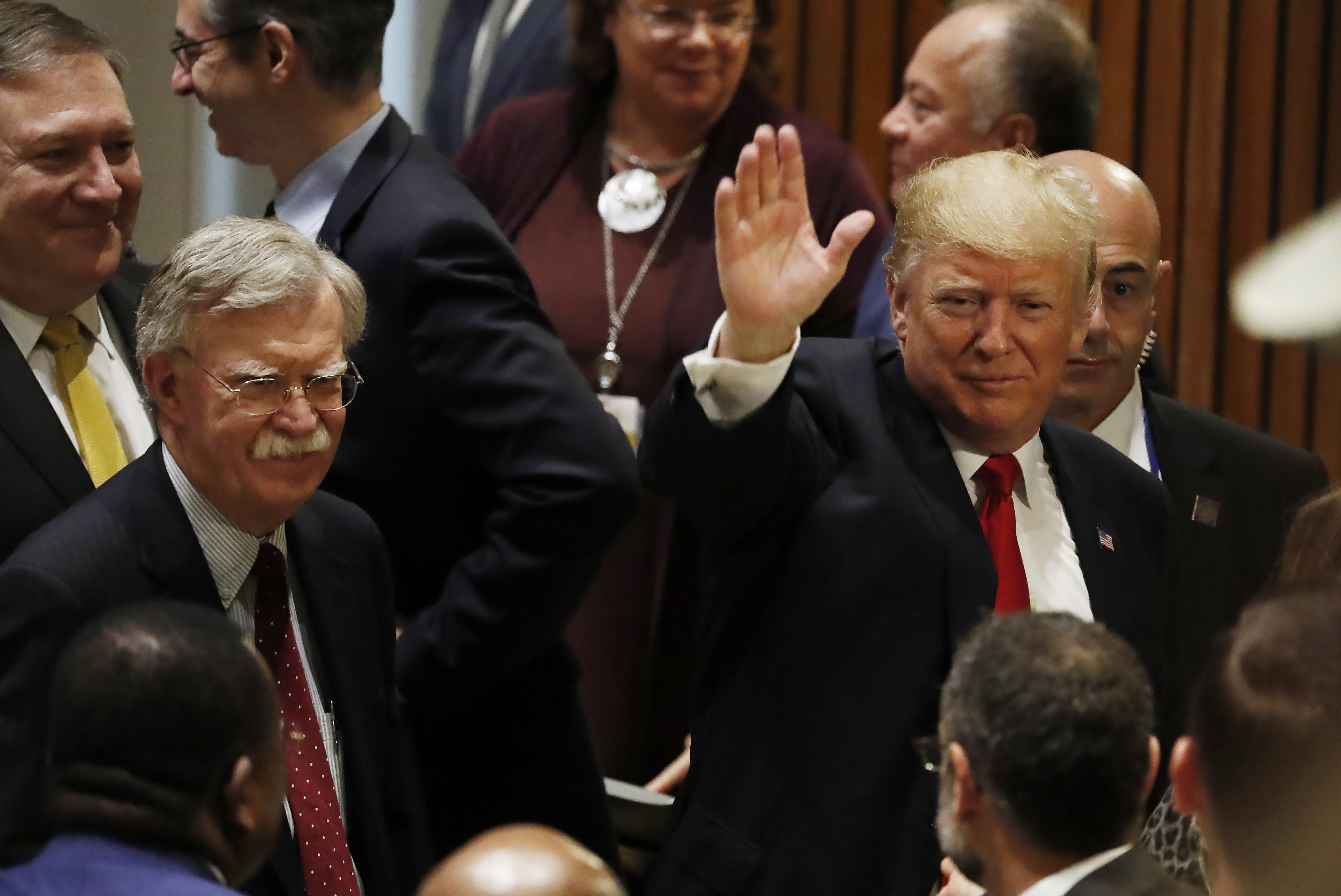epa07832877 (FILE) - US President Donald Trump (R) waves as he departs with US National Security Advisor John Bolton (2L) and US Secretary of State Mike Pompeo (L) after speaking during a US-organized high-level event on Counter Narcotics in the 73rd session of the General Assembly of the United Nations at United Nations Headquarters in New York, New York, USA, 24 September 2018 (Reissued 10 September 2019). Trump tweeted on 10 September 2019 that he asked his national security advisor John Bolton to resign and that he will name a new advisor on the following week.  EPA/JASON SZENES *** Local Caption *** 54649382